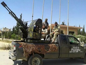Ford F-250 Super Duty firmy Mark-1 Plumbing jako vozidlo džihádistické skupiny Ansar al-Din